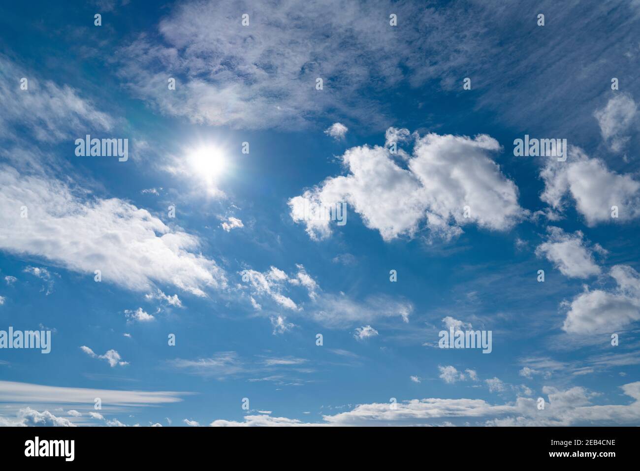 Blue sky with white clouds in a sunny day Stock Photo - Alamy