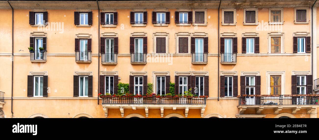 Windows of residential house in Rome Stock Photo - Alamy
