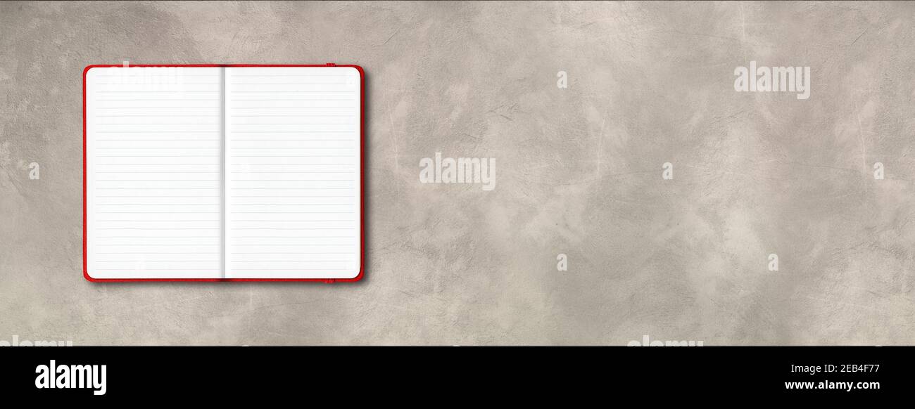Red open lined notebook mockup isolated on concrete background. Horizontal banner Stock Photo