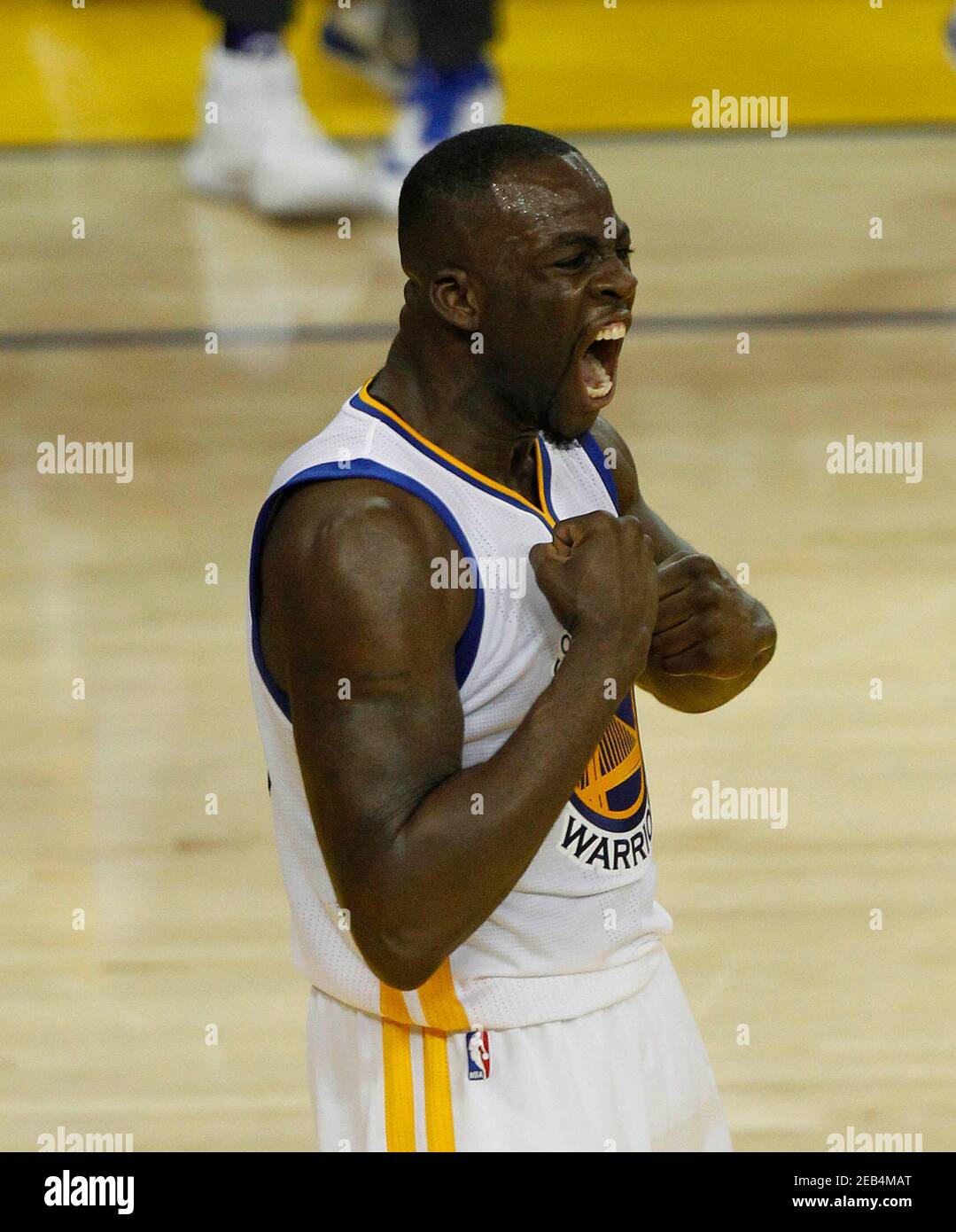 June 19, 2016; Oakland, CA, USA; Golden State Warriors forward Draymond  Green (23) reacts after scoring a basket against Cleveland Cavaliers in the  first half in game seven of the NBA Finals