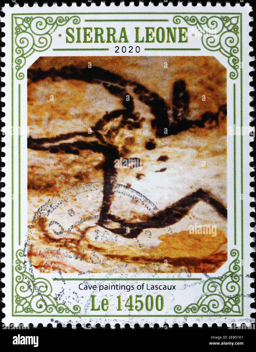 Aurochs in cave paintings of Lascaux on postage stamp Stock Photo