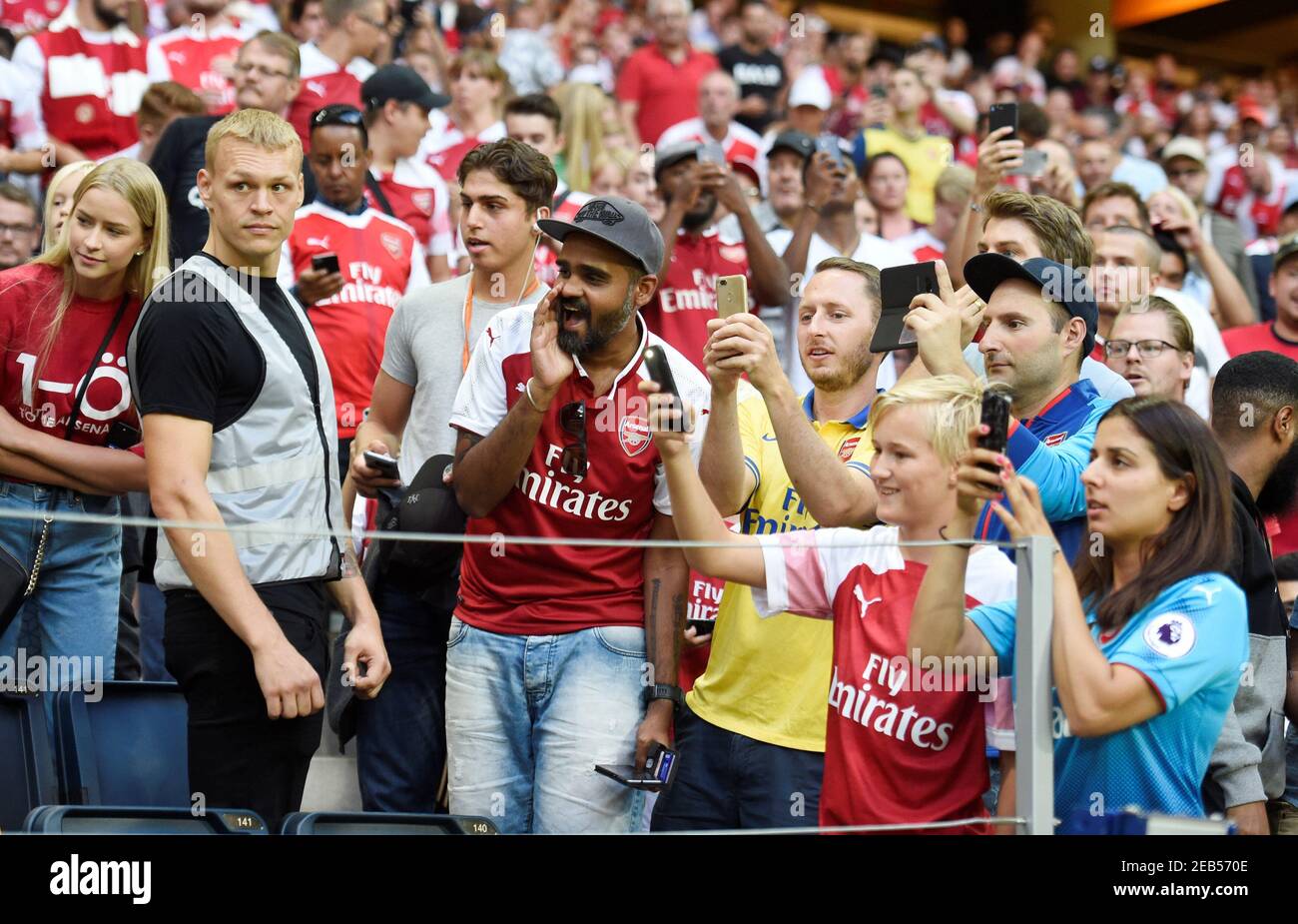 Soccer Football - Pre Season Friendly - Lazio v Arsenal - Friends Arena, Stockholm, Sweden - August 4, 2018 Arsenal fans take photos during the match REUTERS/Fabian Bimmer Stock Photo