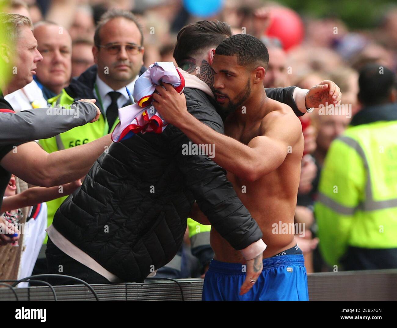 Soccer Football - Premier League - Crystal Palace vs West Bromwich Albion - Selhurst Park, London, Britain - May 13, 2018   Crystal Palace's Ruben Loftus-Cheek with a fan after the match   REUTERS/Hannah McKay    EDITORIAL USE ONLY. No use with unauthorized audio, video, data, fixture lists, club/league logos or 'live' services. Online in-match use limited to 75 images, no video emulation. No use in betting, games or single club/league/player publications.  Please contact your account representative for further details. Stock Photo