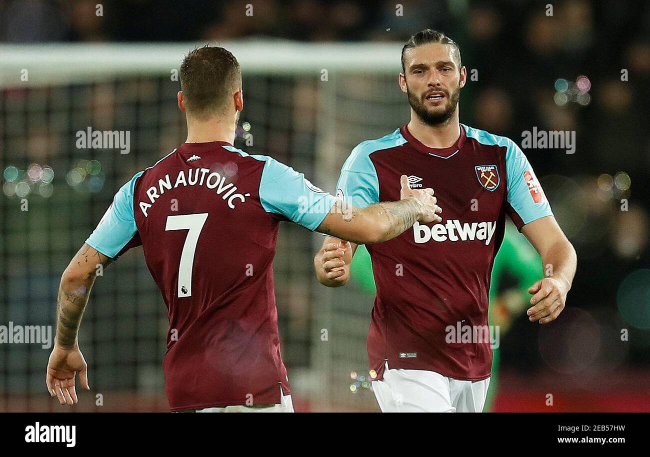 Soccer Football - Premier League - West Ham United vs West Bromwich Albion - London Stadium, London, Britain - January 2, 2018   West Ham United's Andy Carroll celebrates scoring their first goal with Marko Arnautovic   REUTERS/Eddie Keogh    EDITORIAL USE ONLY. No use with unauthorized audio, video, data, fixture lists, club/league logos or 'live' services. Online in-match use limited to 75 images, no video emulation. No use in betting, games or single club/league/player publications.  Please contact your account representative for further details. Stock Photo