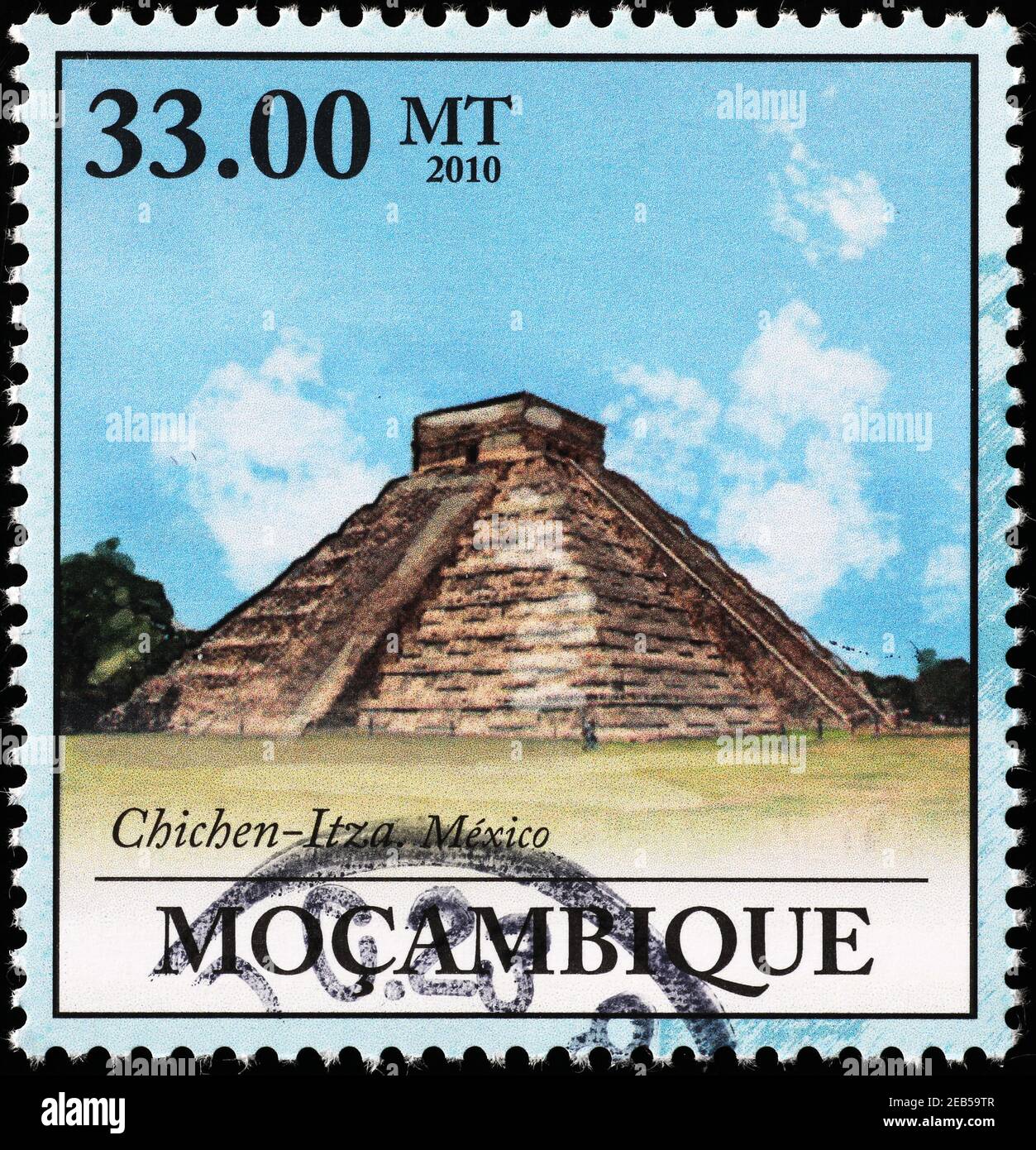 Pyramid of Chichen Itza in Mexico on postage stamp Stock Photo