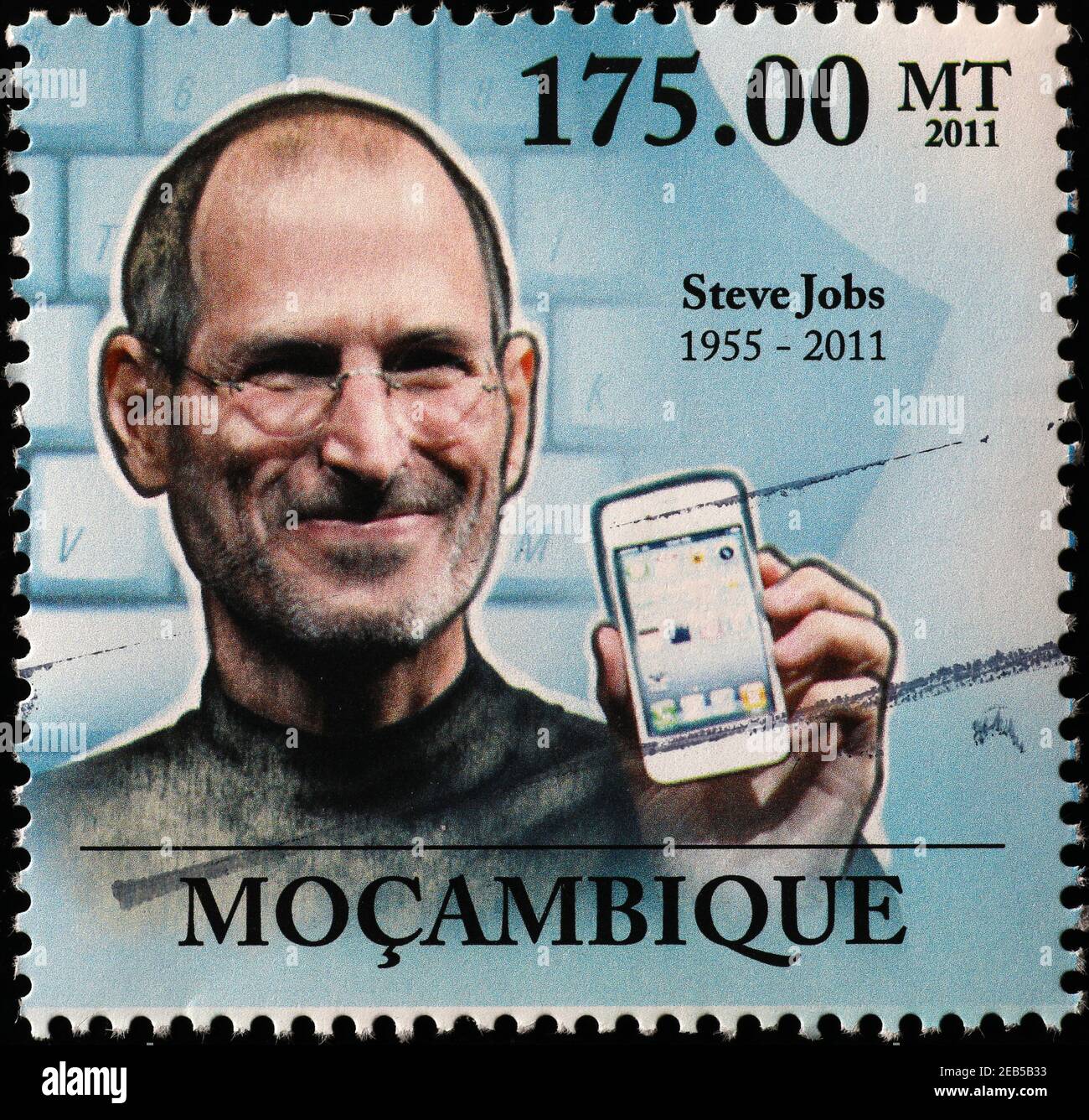 Steve Jobs showing an I-Phone on postage stamp Stock Photo