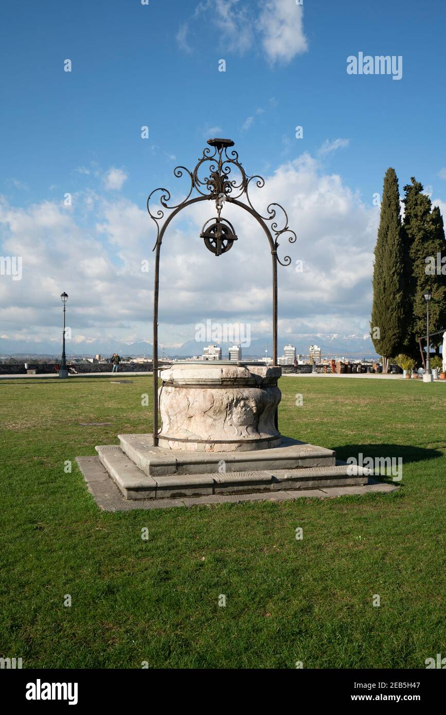 Udine, Italy. February 11, 2020. the well in the center of the meadow on the castle hill in the city center Stock Photo