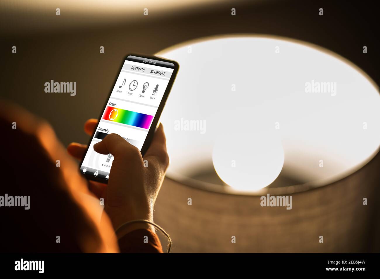 Smart Light Control At House Using Phone Stock Photo