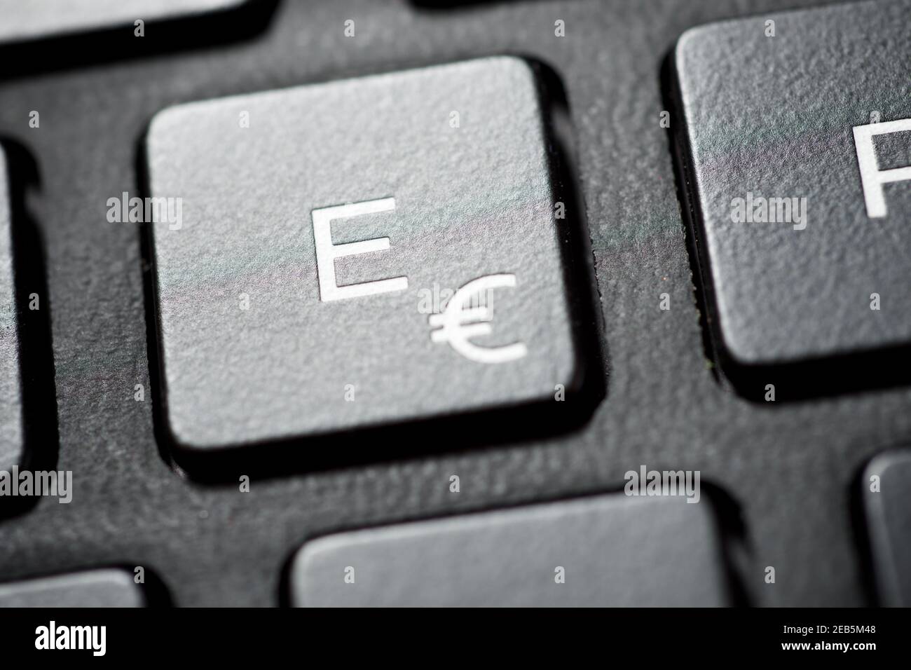 Euro symbol on a keyboard of a laptop Stock Photo Alamy