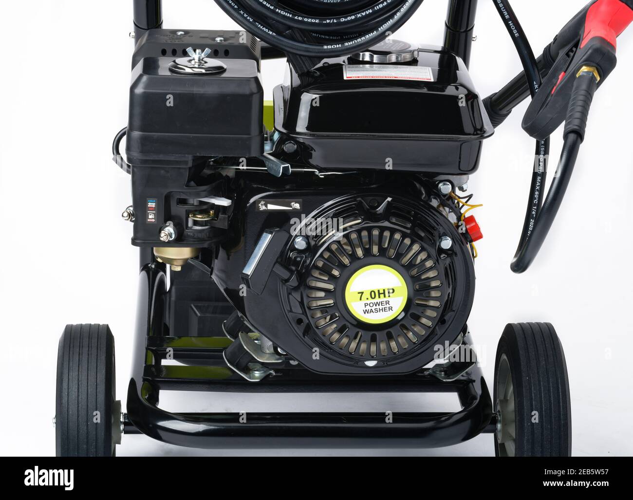 Petrol engined pressure washer. Water pumped through a powerful engine to make a strong jet for cleaning outdoor surfaces. Cars, patios, boats etc. Stock Photo