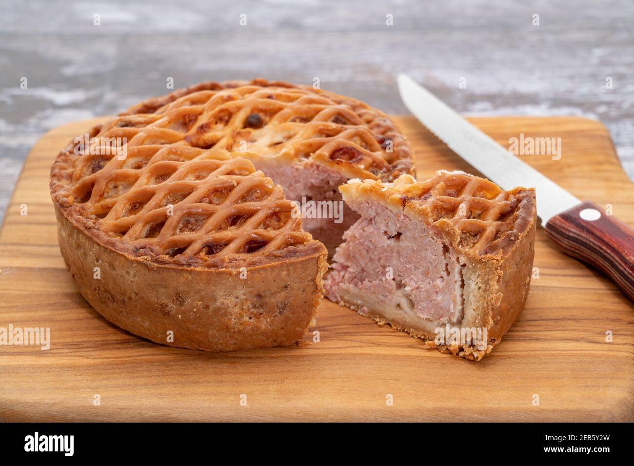 Pork pie with a lattice pattern pastry crust Stock Photo Alamy