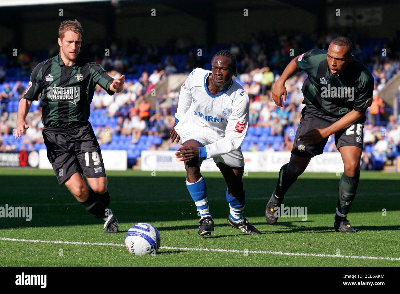 Football - Tranmere Rovers v Walsall Coca-Cola Football League One -  Prenton Park - 09/10 - 12/9/09 Tranmere's Kithson Bain (C) in action with  Walsall's Jamie Vincent (L) and Clayton McDonald Mandatory