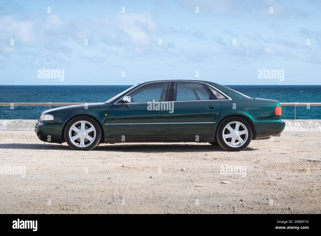 BARCELONA, SPAIN-FEBRUARY 2, 2021: Audi S8 (First generation, D2, 1996 - 2003) parking next to sea Stock Photo