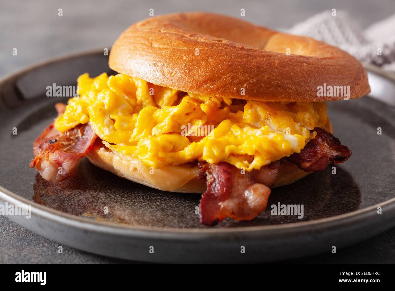 breakfast egg and bacon sandwich on bagel with cheese Stock Photo - Alamy
