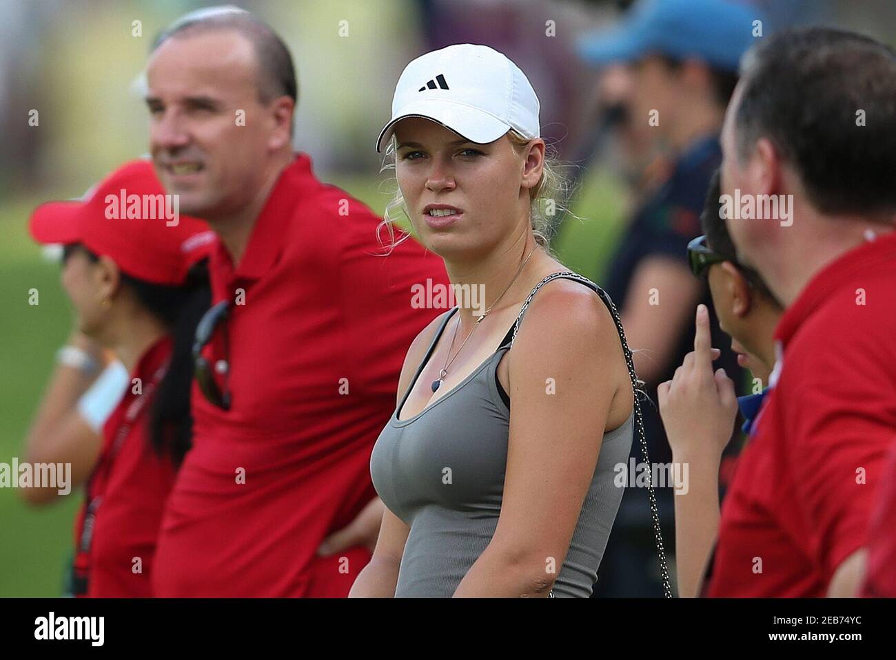 Golf - Barclays Singapore Open - Sentosa Golf Club, Singapore - 10/11/12  Denmark's Caroline Wozniacki, girlfriend of Northern Ireland's Rory McIlroy  (not pictured), looks on as play resumes for the second round