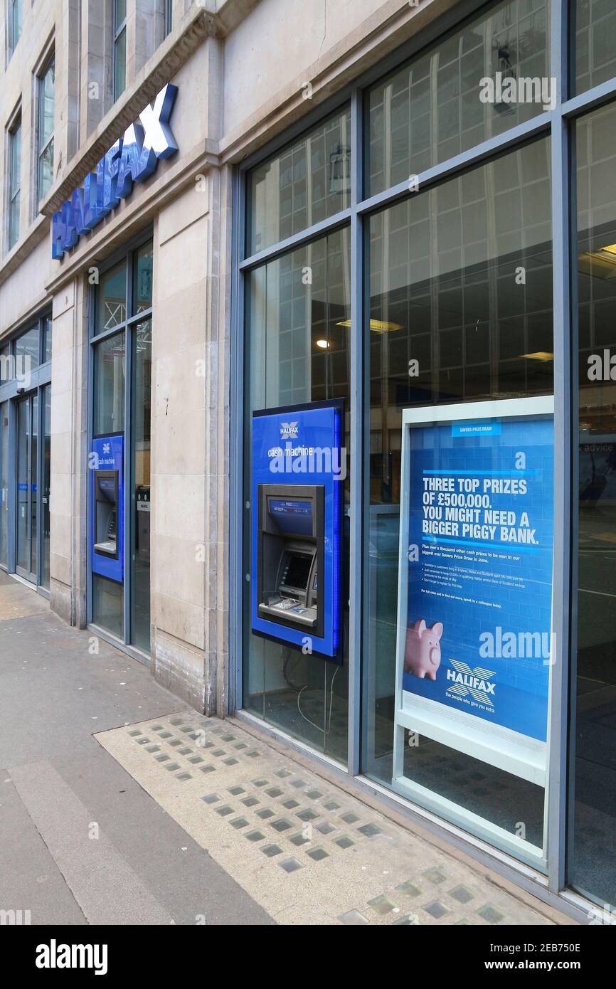 LONDON, UK - APRIL 23, 2016: Halifax Bank ATMs in London, UK. Halifax is part of Lloyds Banking Group, one of largest banking corporations in Europe. Stock Photo
