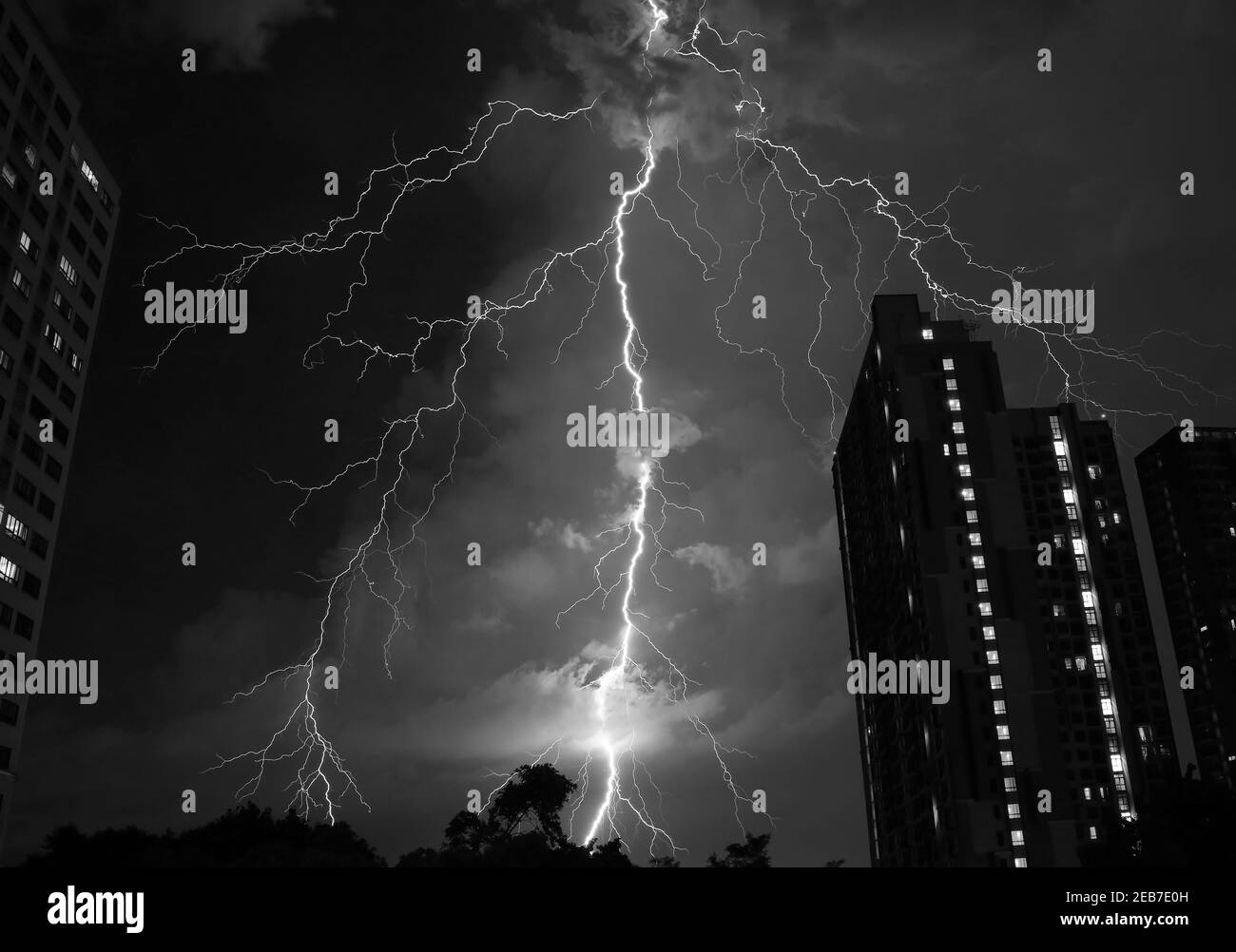 Monotone Colored Spectacular Real Lightning Strikes in the Night Sky Stock Photo