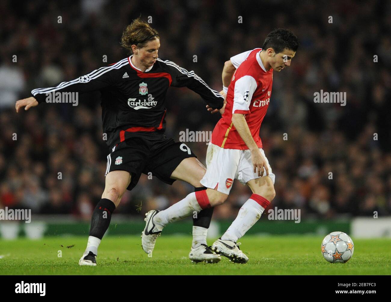 Football - Arsenal v Liverpool - UEFA Champions League Quarter Final First  Leg - The Emirates Stadium, London, England - 07/08 - 2/4/08 Arsenal's Cesc  Fabregas in action against Liverpool's Fernando Torres (