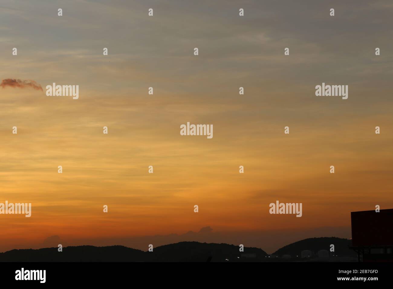 View of the city and mountain after the sunset,Sky in the twilight for design in your work. Stock Photo