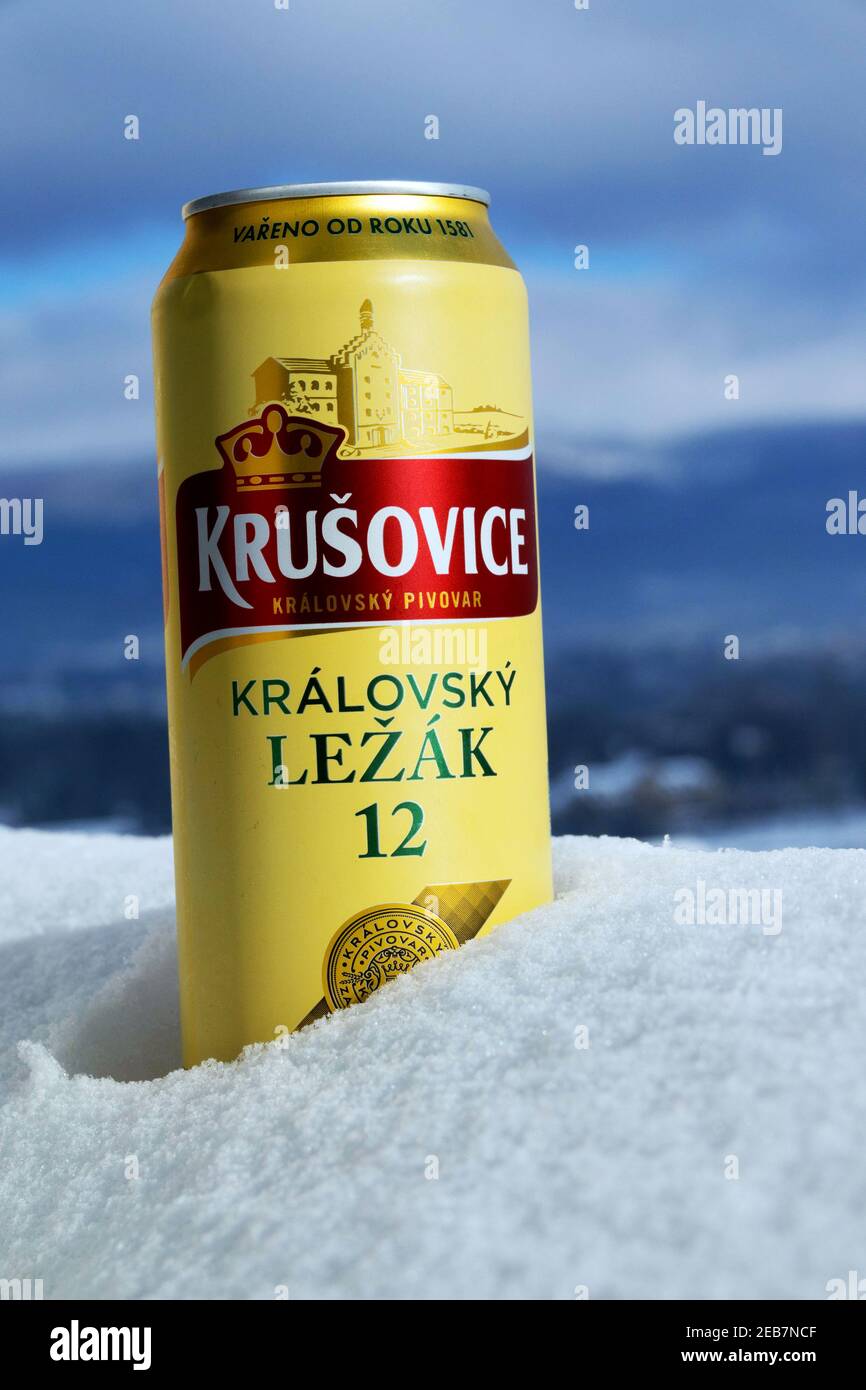 Czech beer can in snow, Krusovice beer Stock Photo