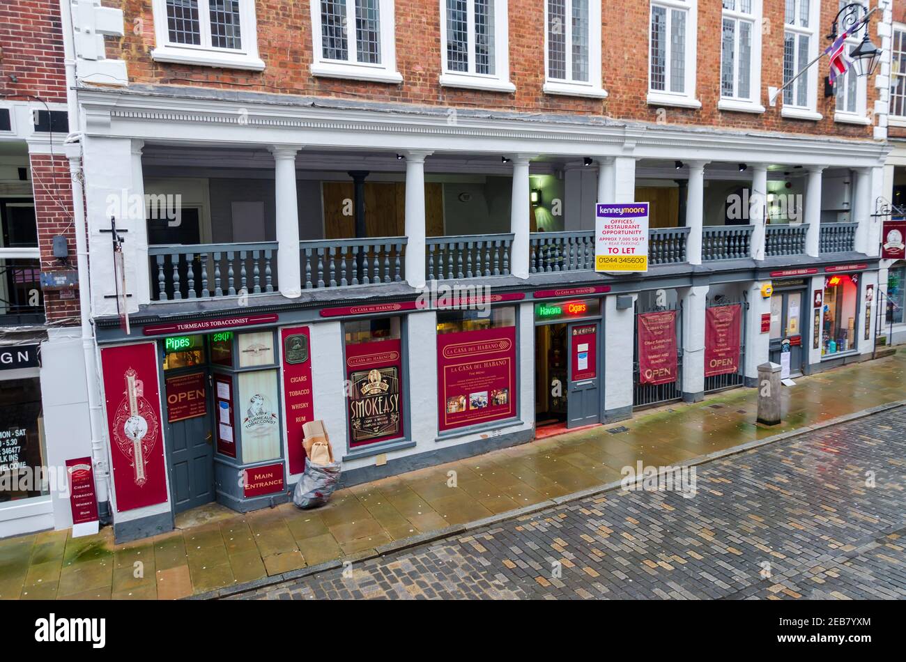 Chester; UK: Jan 29, 2021: The Turmeaus Whiskey and Cigar shop on Watergate Street are specialist retailers. Stock Photo