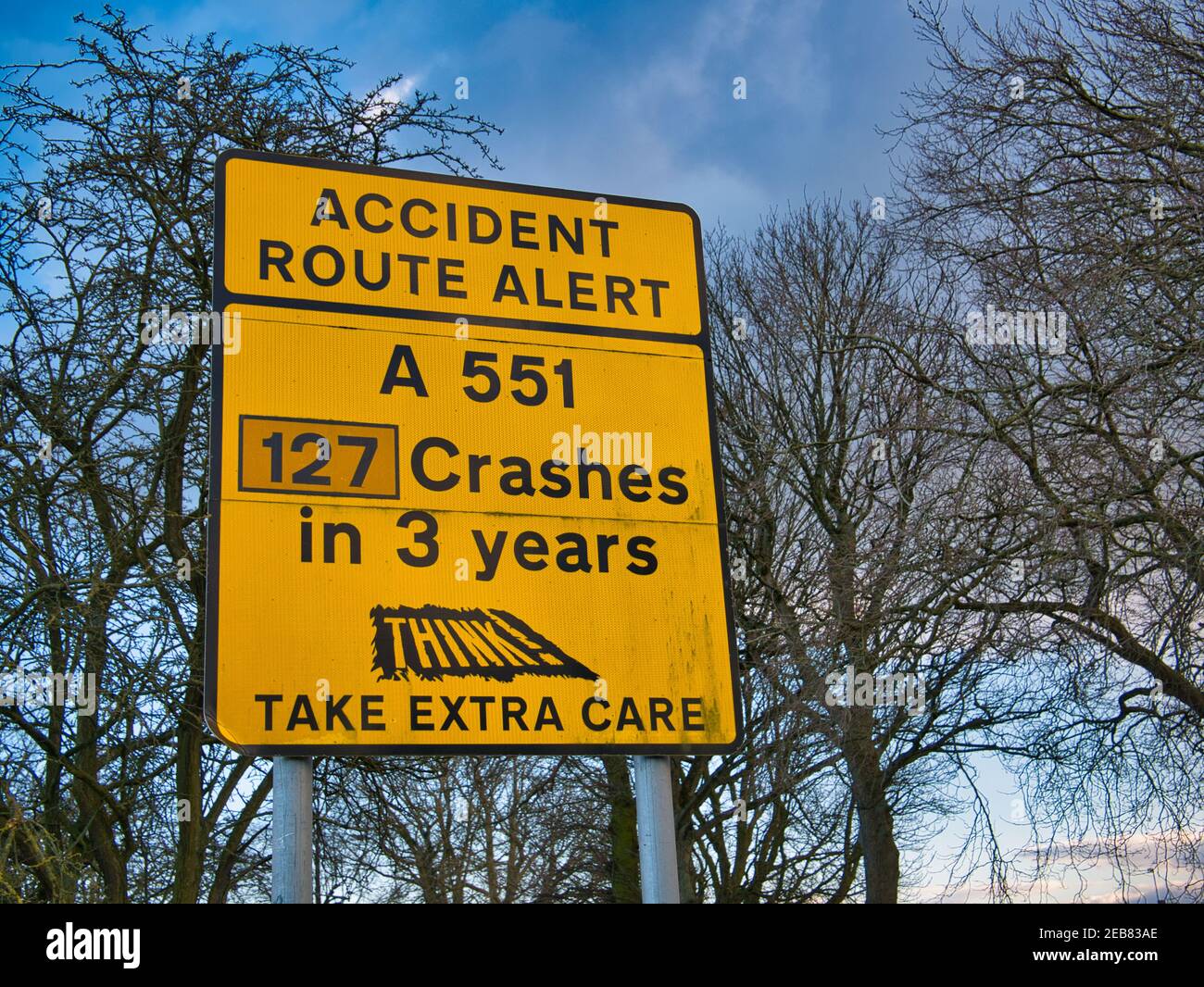 An accident route alert sign in the UK. The sign warns that drivers should take extra care on a stretch of road that has seen many accidents. The sign Stock Photo