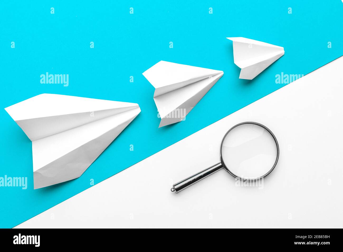 paper airplanes on pastel colored background. childhood,freedom and