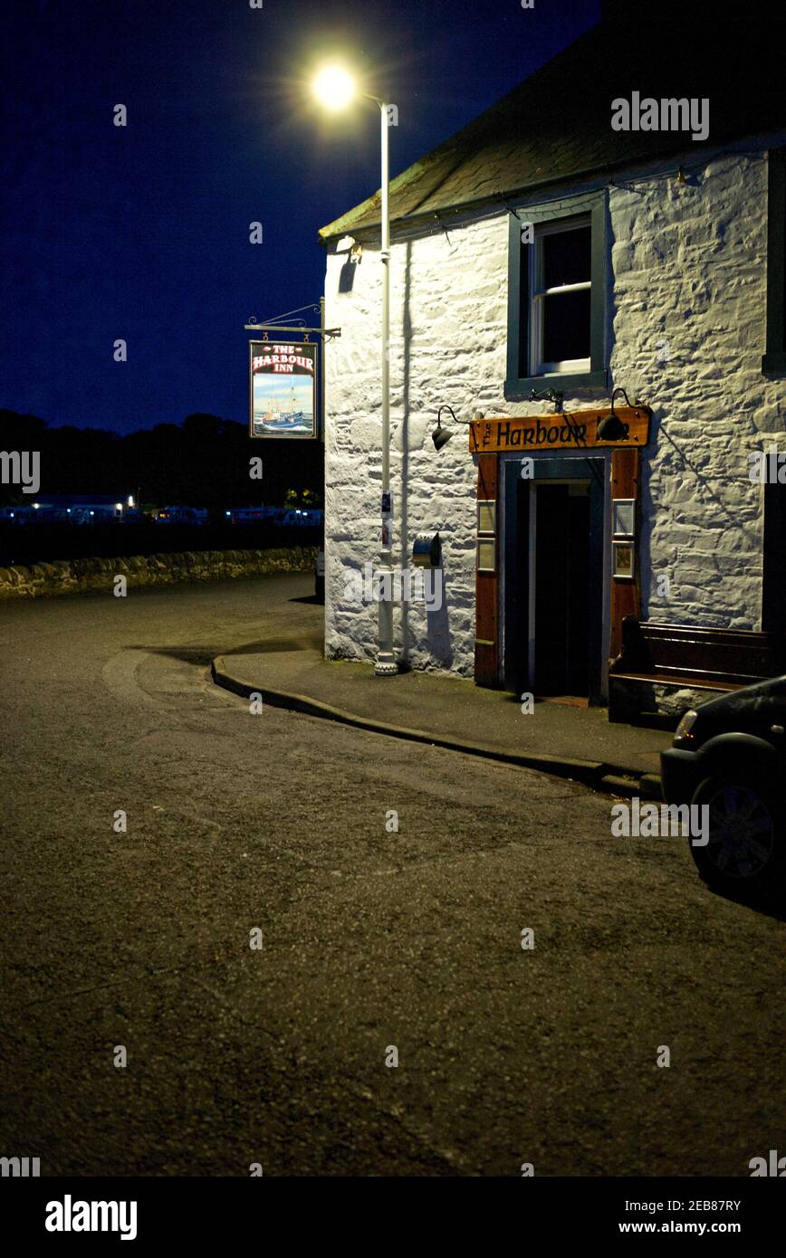 South West Scotland village Garlieston at night with the street  lights shinning. Stock Photo