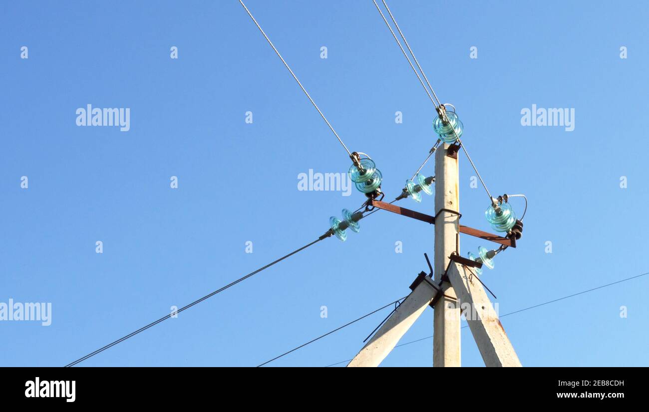 corner transmission tower of high voltage overhead power line top