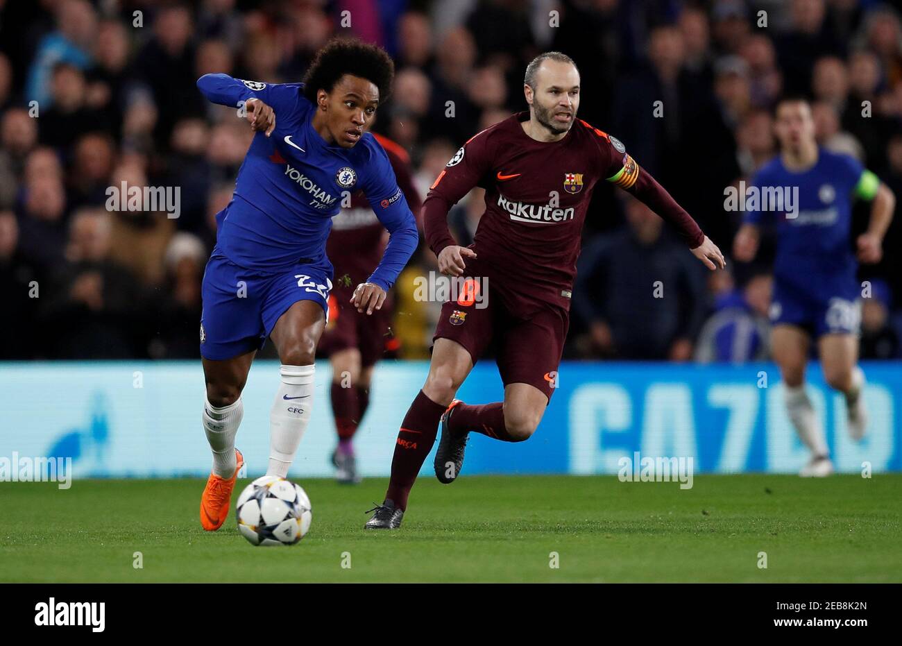 Soccer Football - Champions League Round of 16 First Leg - Chelsea vs FC Barcelona - Stamford Bridge, London, Britain - February 20, 2018   Chelsea's Willian in action with Barcelona’s Andres Iniesta     REUTERS/Eddie Keogh Stock Photo