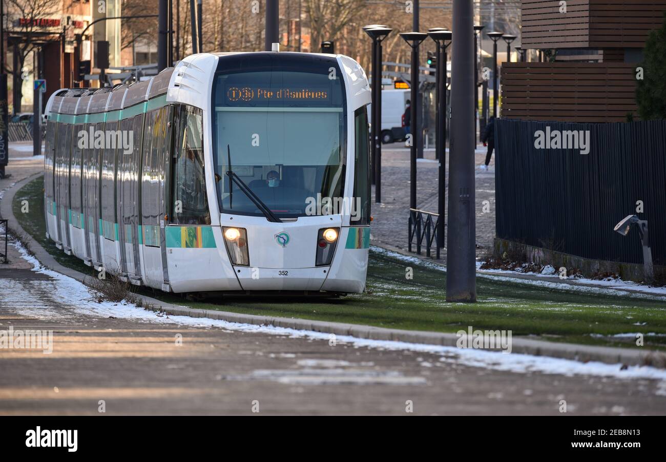 Close-up view of a tramway in motion, line T3. Managed by the RATP, it follows the Boulevards des Marechaux, encircling Paris. Stock Photo