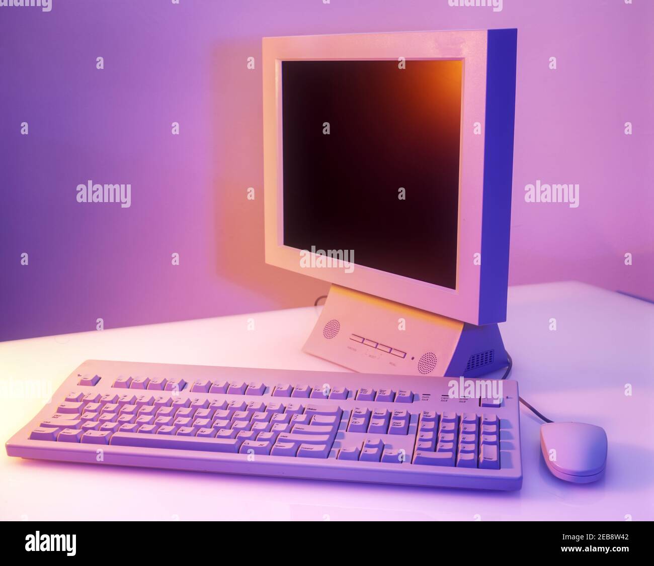 2000 HISTORICAL PERSONAL COMPUTER FLAT MONITOR SCREEN (©2000 SONY CORP) KEYBOARD & MOUSE (©2000 APPLE INC) Stock Photo