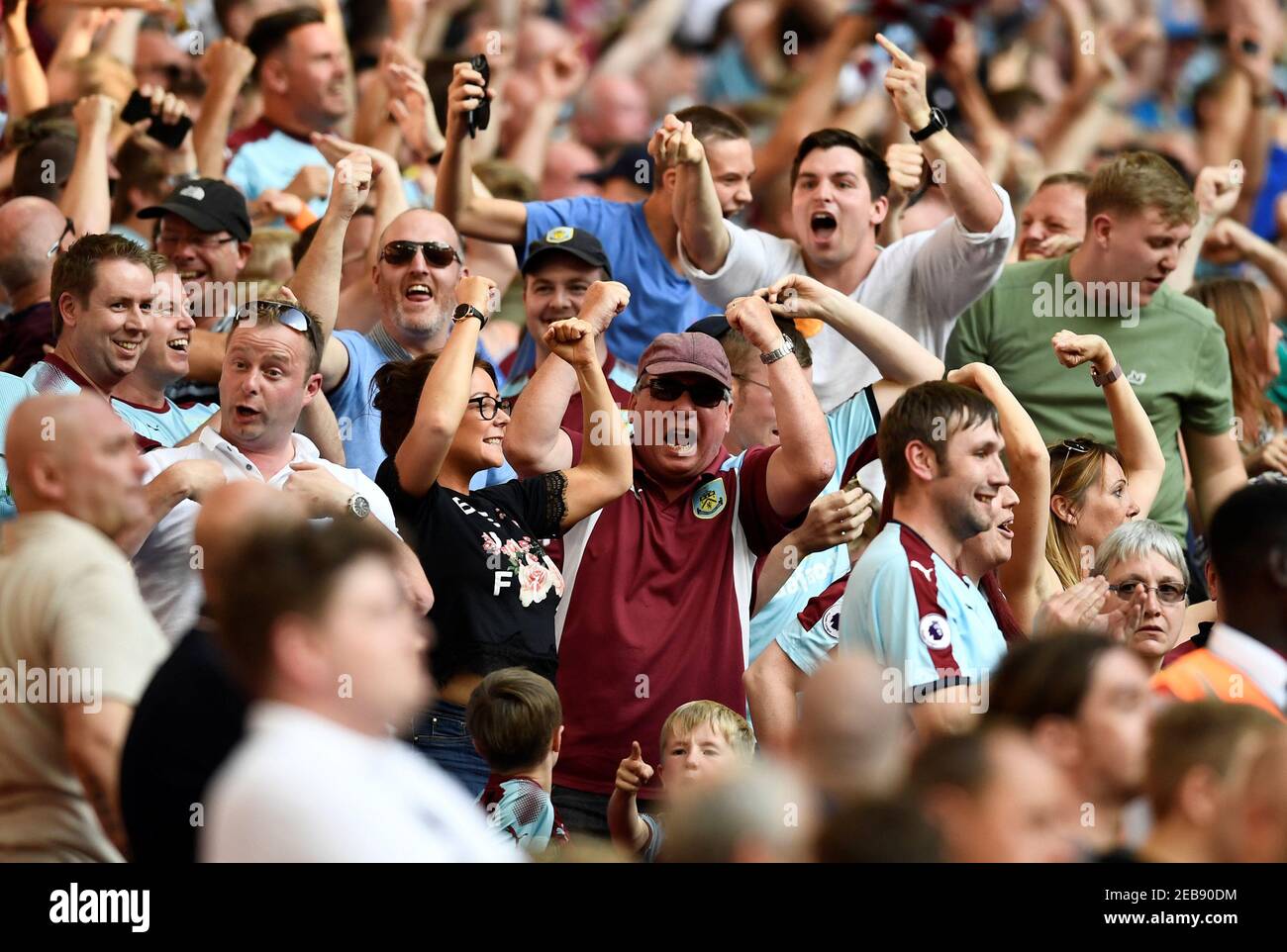 Soccer Football - Premier League - Tottenham Hotspur vs Burnley - London, Britain - August 27, 2017   Burnley fans celebrate their first goal   REUTERS/Dylan Martinez    EDITORIAL USE ONLY. No use with unauthorized audio, video, data, fixture lists, club/league logos or 'live' services. Online in-match use limited to 45 images, no video emulation. No use in betting, games or single club/league/player publications. Please contact your account representative for further details. Stock Photo