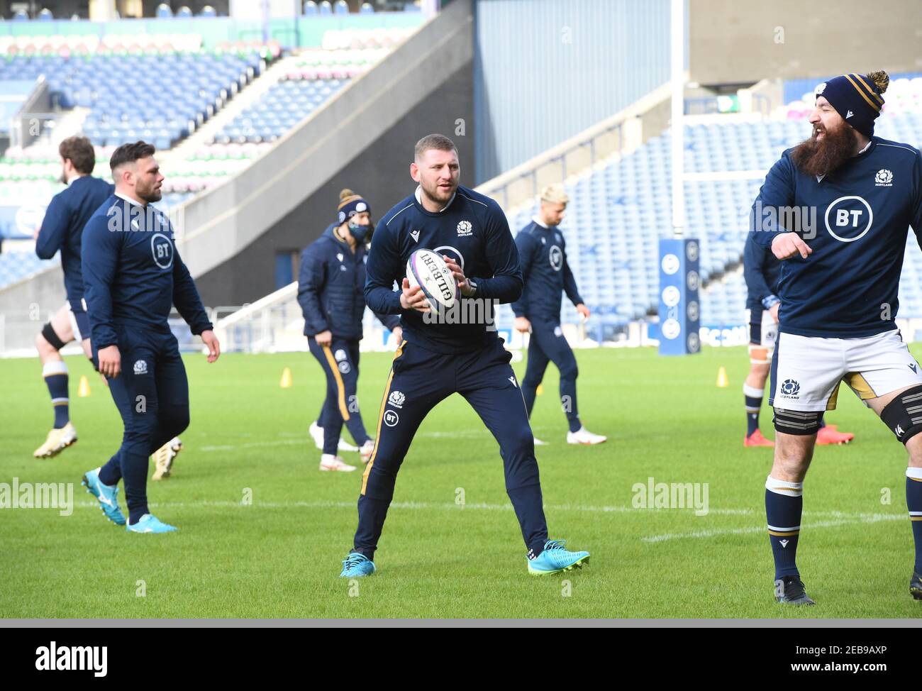 BT Murrayfield Stadium, Edinburgh.Scotland UK.12th Feb 21. Scotland Rugby Squad training session for the Guinness Six Nations match vs Wales Pic Shows Scotland Finn Russell (Racing 92) & Gary Graham (Newcastle Falcons) (R) Credit: eric mccowat/Alamy Live News Stock Photo