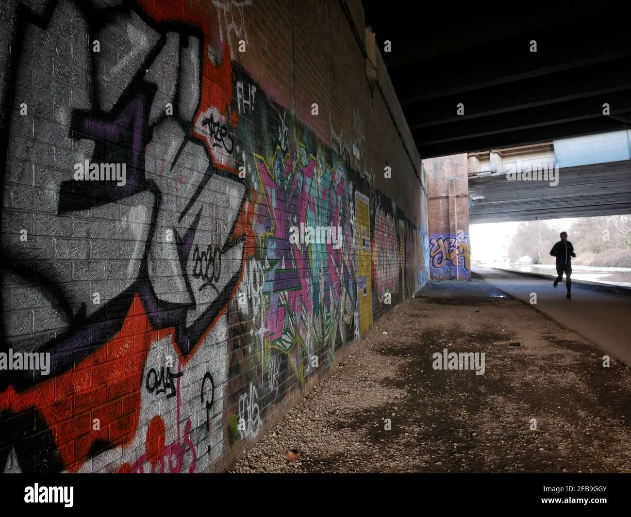 Stretford, Manchester, UK. 9 February 2021. Path used by walkers, runners and cyclists near the Bridgewater Canal. Credit: Julian Brown Stock Photo