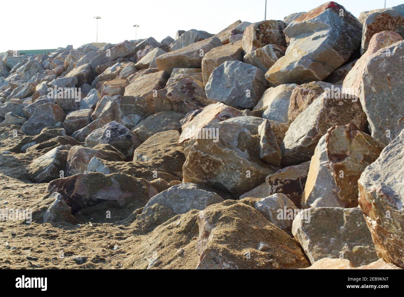 Rip rap aka rock armour aka shot rock on Marazion beach. The sea defences protect the beach from coastal erosion Stock Photo