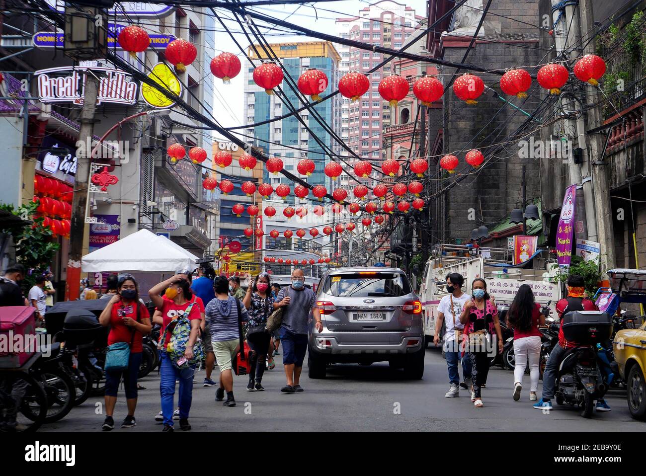 Manila, National Capital Region, Philippines. 12th Feb, 2021. The street of Ongpin used to be crowded with people this Chinese New Year but now only Chines lanterns decorated for this year. Manila cancels the dragon dance and lion dance this Chinese New Year due to the pandemic. Credit: George Buid/ZUMA Wire/Alamy Live News Stock Photo