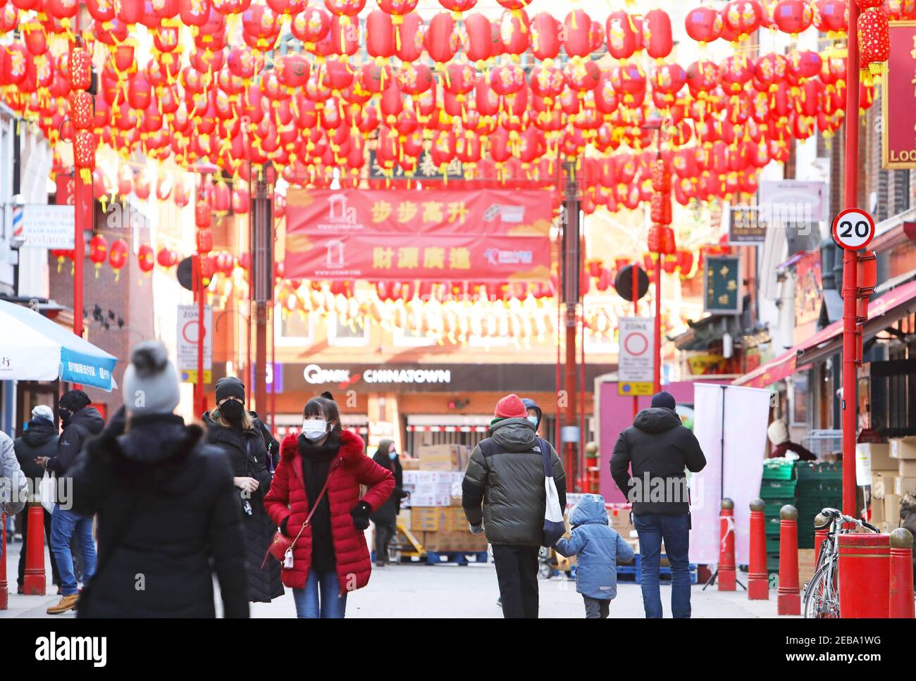 London, UK, February 12th 2021. Traditional lanterns up for Chinese New Year celebrations in China Town, London, UK. Covid restrictions and freezing temperatures meant people had to celebrate at home for the start of the Year of the Ox. Monica Wells/Alamy Live News Stock Photo