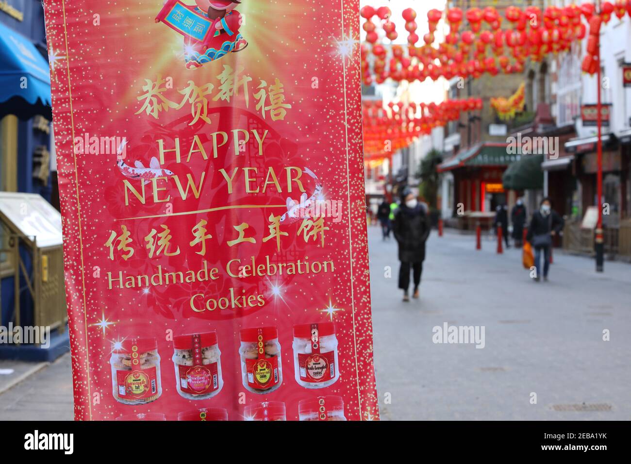 London, UK, February 12th 2021. Traditional lanterns up for Chinese New Year celebrations in China Town, London, UK. Covid restrictions and freezing temperatures meant people had to celebrate at home for the start of the Year of the Ox. Monica Wells/Alamy Live News Stock Photo