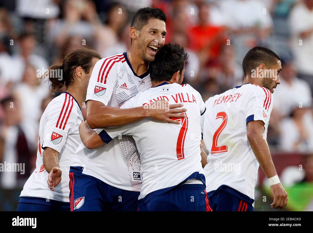 Football - MLS All-Stars v Tottenham Hotspur - AT&T MLS All Stars Game - Pre Season Friendly - Dick's Sporting Goods Park, Colorado, United States of America - 29/7/15  MLS All-Stars's Omar Gonzalez (2nd from L) and David Villa celebrate a goal  Action Images via Reuters / Rick Wilking  Livepic Stock Photo