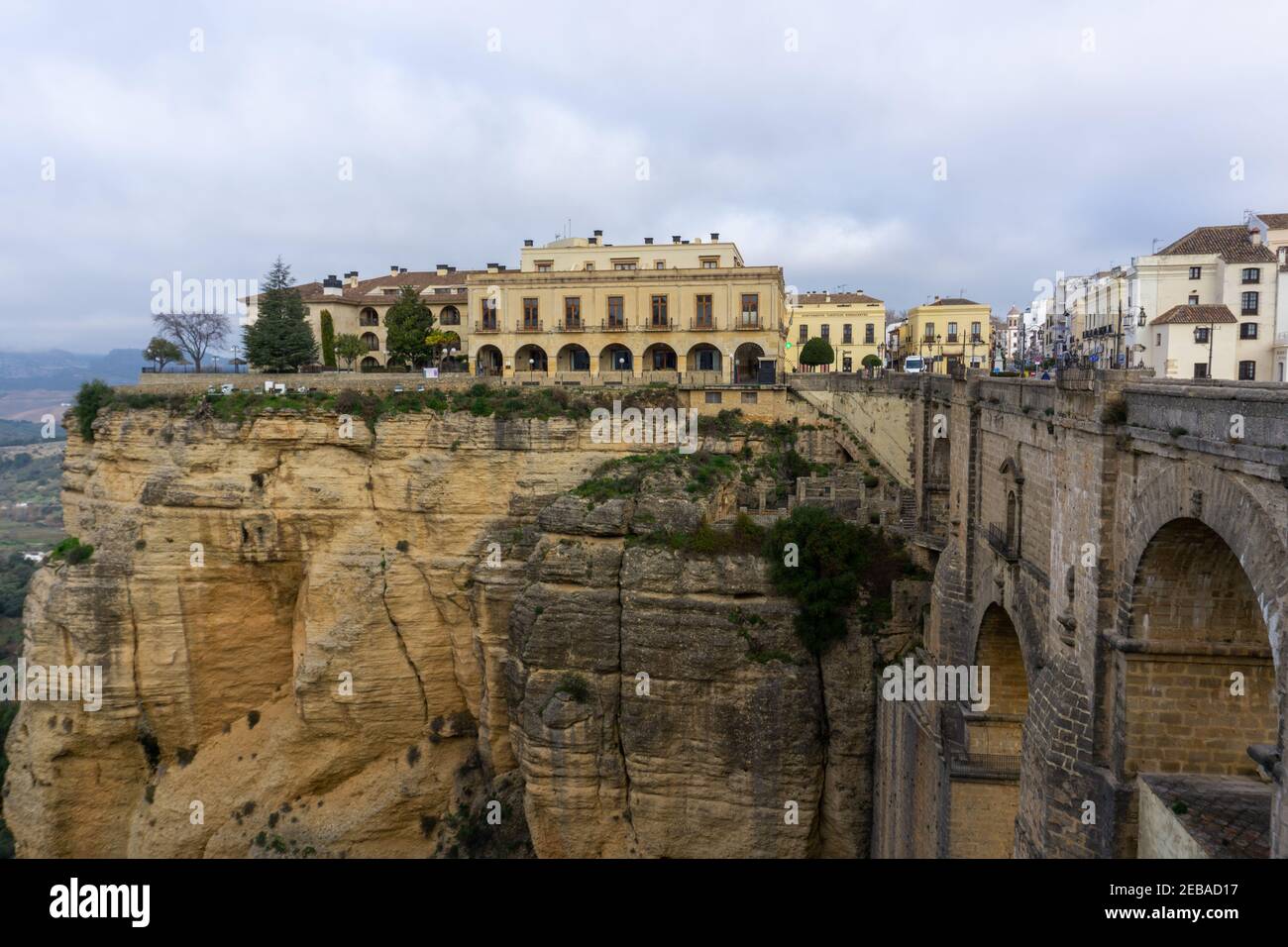 Ronda, Spain - 2 February, 2021: A view of the old town of Ronda and the Puente Nuevo over El Tajo Gorge Stock Photo