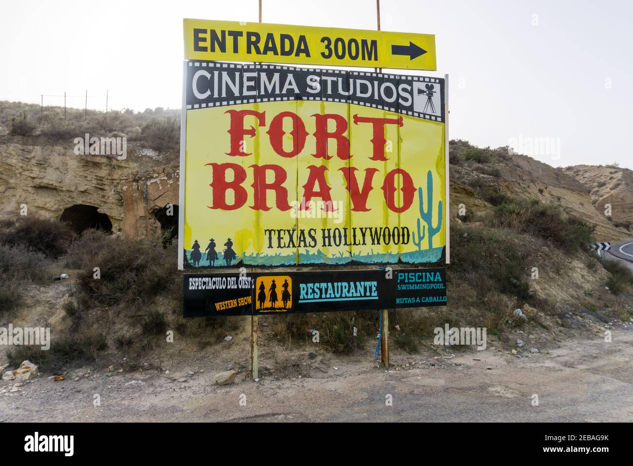 Tabernas, Spain - 6 February, 2021: view of the Tabernas desert and the billoboard for the Fort Bravo Western Theme Park Stock Photo