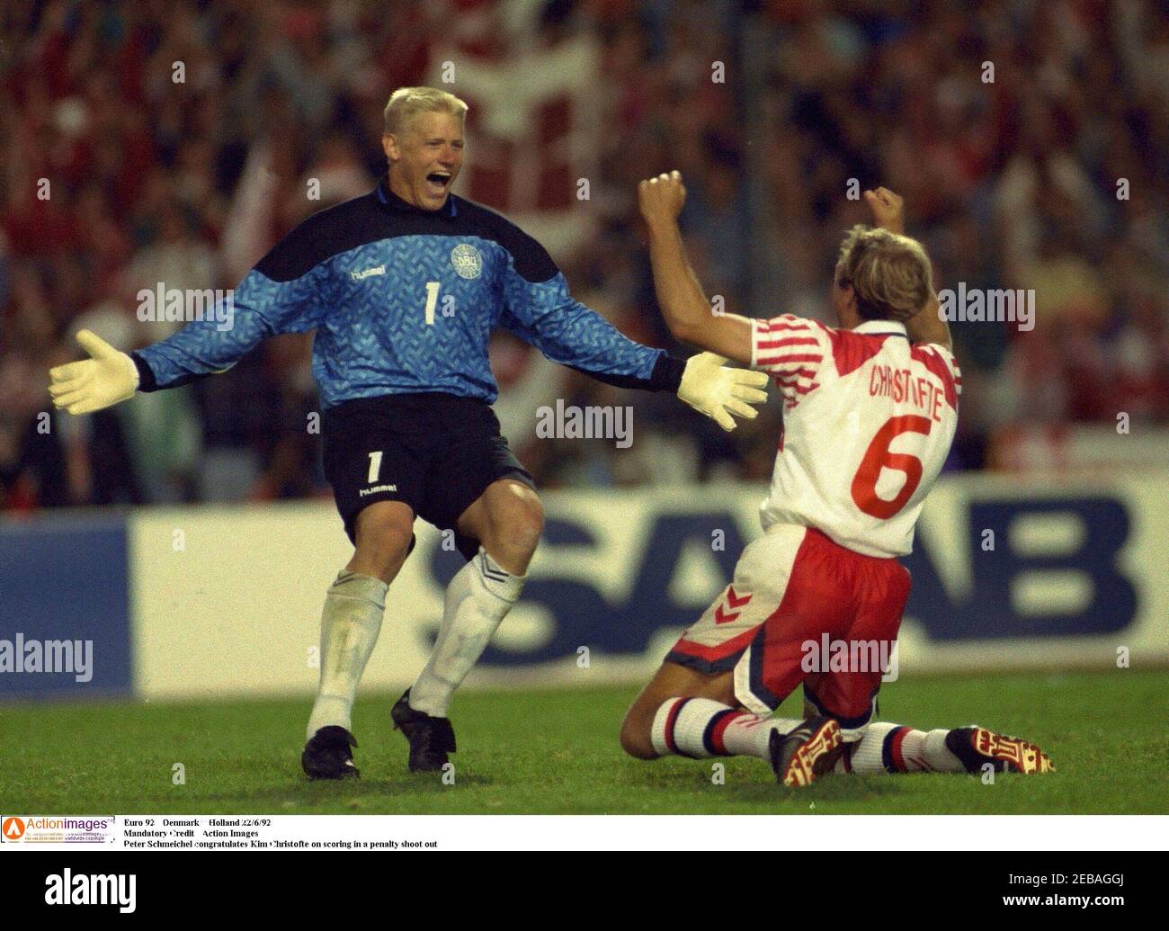 Football - 1992 European Championships - Euro 92 Semi Final - Denmark v  Holland - 22/6/92 Goalkeeper Peter Schmeichel (L) congratulates Kim  Christofte on scoring the crucial penalty to send Denmark through