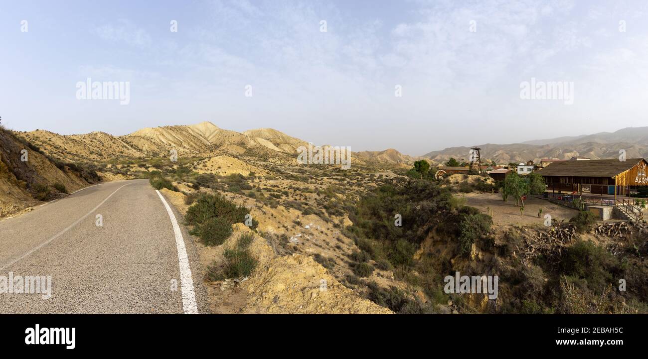 Tabernas, Spain - 6 February, 2021: panorama view of the Tabernas desert in Andalusia with a Spaghetti Western film set ghost town Stock Photo