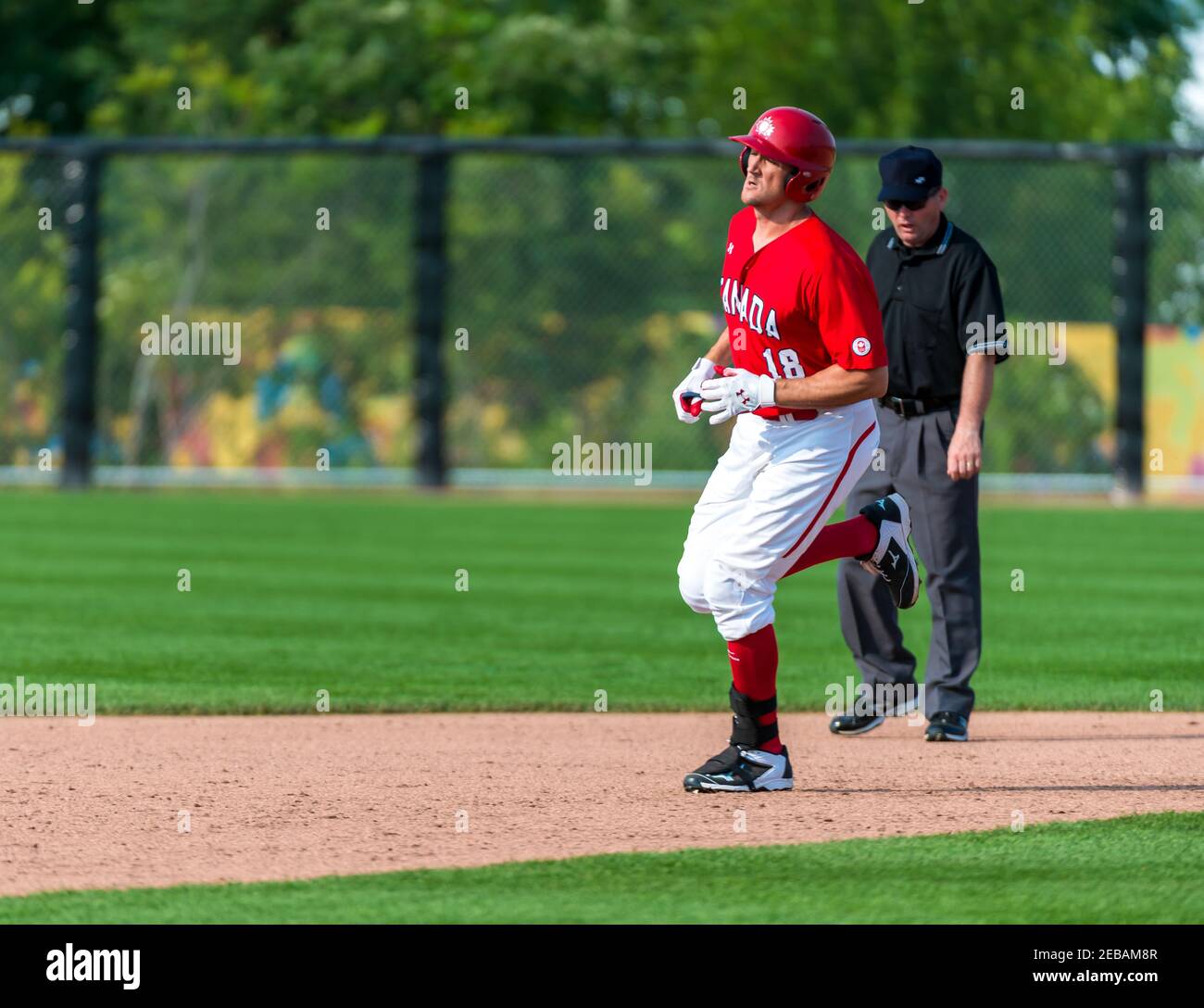 Toronto Pan American Games 2015, Baseball tournament: Pinch hitter Brock Kjeldgaard substitutes Jordan Lennerton and bats a home run in the bottom of Stock Photo