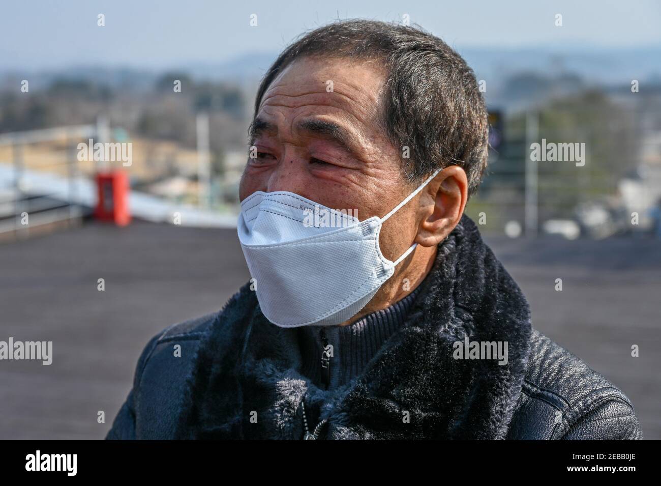 Paju, South Korea. 12th Feb, 2021. Son Ju-han, a North Korean defector tears up as he talks near the DMZ at Imjingak Park in Paju, South Korea on February 12, 2021. He came to make an offering on Lunar New Year and pray for reunification. Photo by Thomas Maresca/UPI Credit: UPI/Alamy Live News Stock Photo