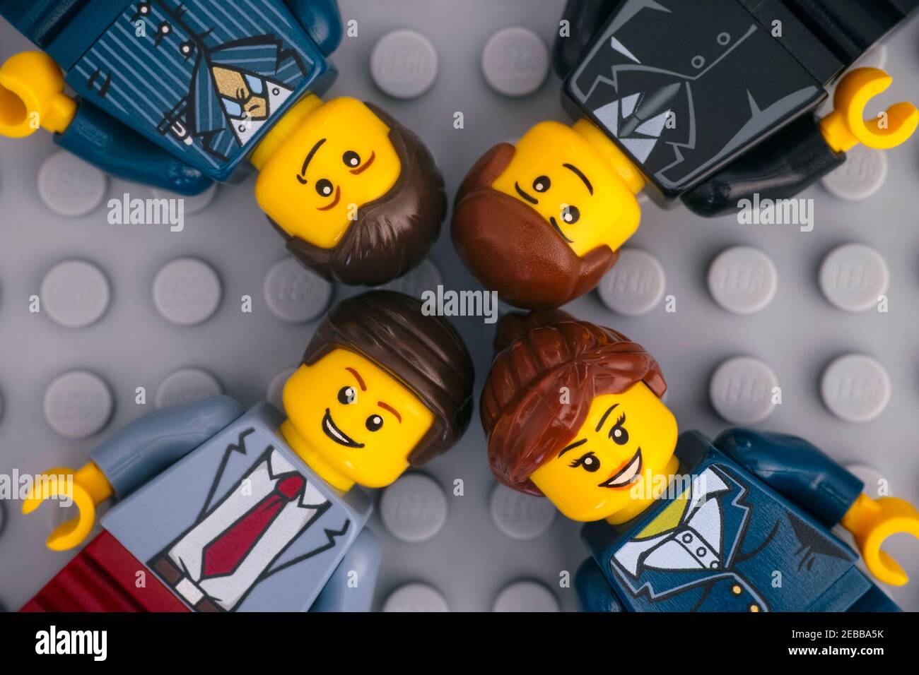 Tambov Russian Federation January 17 2021 Four Lego Businesspeople minifigures on gray baseplate background Stock Photo Alamy