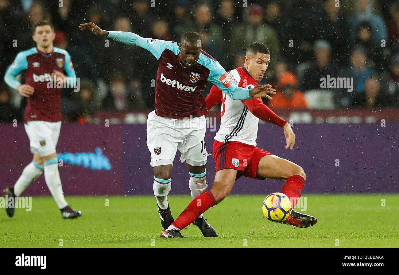 Soccer Football - Premier League - West Ham United vs West Bromwich Albion - London Stadium, London, Britain - January 2, 2018   West Ham United's Pedro Obiang in action with West Bromwich Albion's Jake Livermore   REUTERS/Eddie Keogh    EDITORIAL USE ONLY. No use with unauthorized audio, video, data, fixture lists, club/league logos or 'live' services. Online in-match use limited to 75 images, no video emulation. No use in betting, games or single club/league/player publications.  Please contact your account representative for further details. Stock Photo