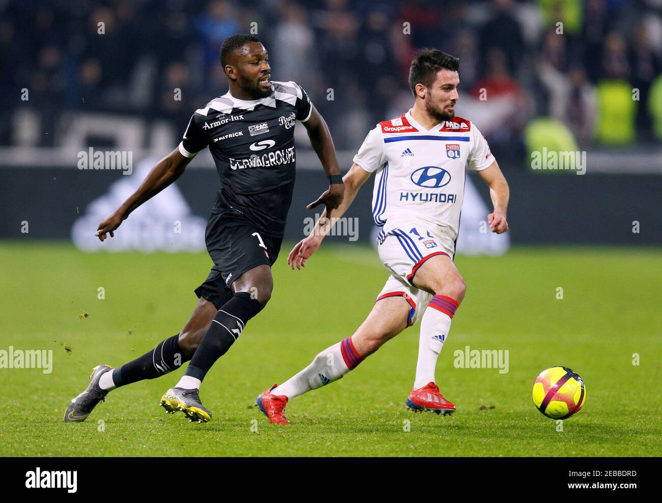 Soccer Football - Ligue 1 - Olympique Lyonnais v Guingamp - Groupama  Stadium, Lyon, France - February 15, 2019 Guingamp's Marcus Thuram in  action with Lyon's Leo Dubois REUTERS/Emmanuel Foudrot Stock Photo - Alamy