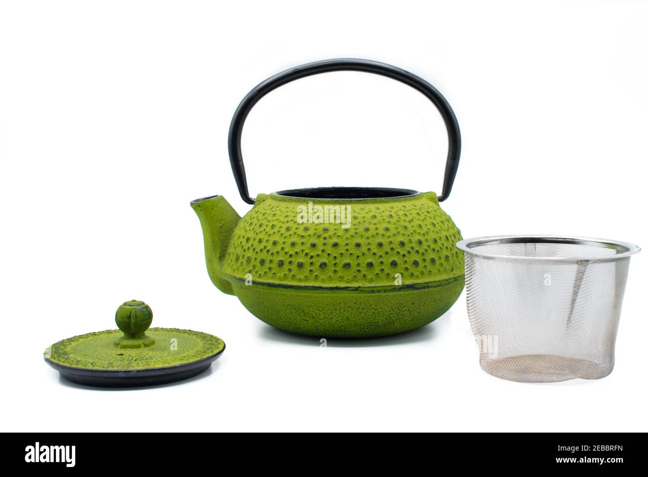 green iron teapot isolated  Stock Photo